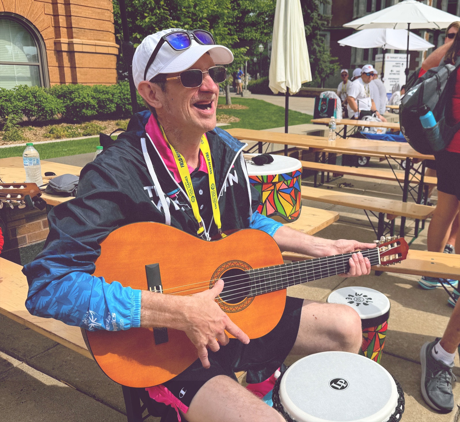 Athlete playing guitar at the Special Olympics Fan Fest