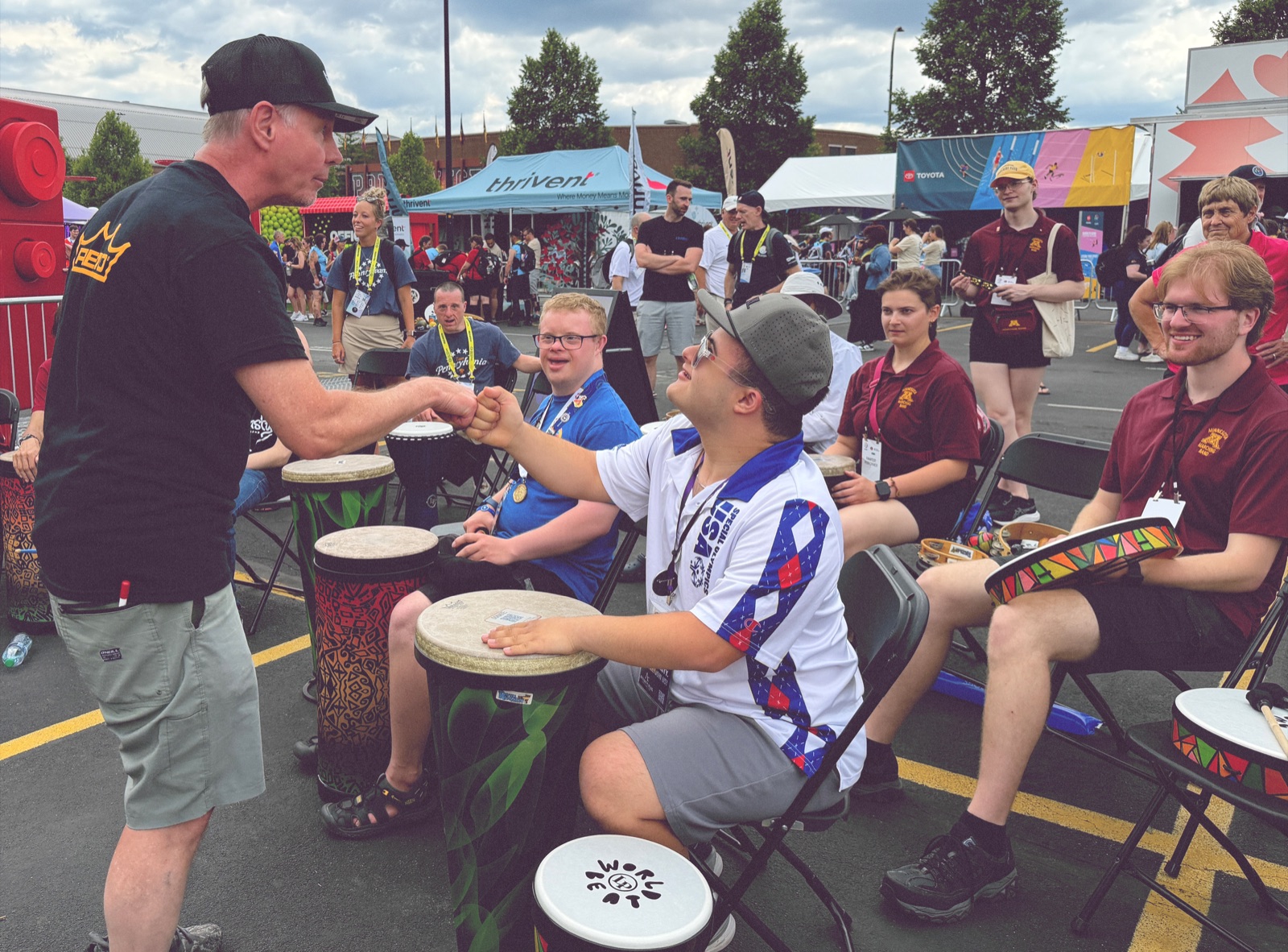 Volunteers leading instrument instruction at the Special Olympics